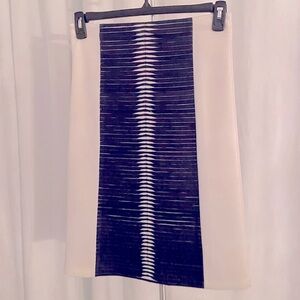 Ivory skirt with navy leather trim